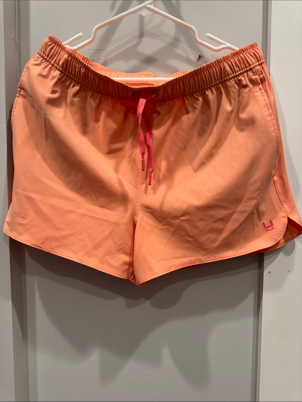 Huk Coral-Orange Athletic Shorts with Pink Drawstring